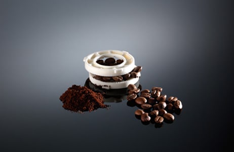 Vous pouvez régler le broyeur au moyen du sélecteur de niveau de mouture dans le réservoir à grains de café.